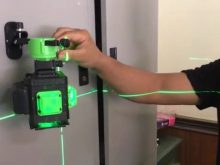 may-can-bang-laser-tia-xanh