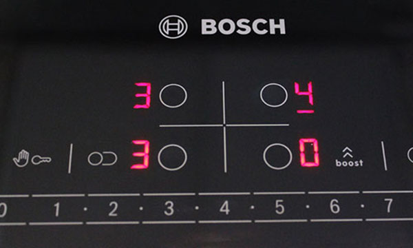 Sử dụng bếp từ Bosch để cài đặt các tính năng hiện đại