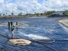 xử lý bùn đáy ao nuôi cá